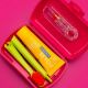 Kolorowy Curaprox Travel Set magenta z pastą Be you grapefruit i składaną szczoteczką CS 5460