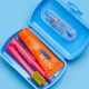 Curaprox Travel Set niebieski z pastą Be you brzoskwinia i morela do higieny poza domem